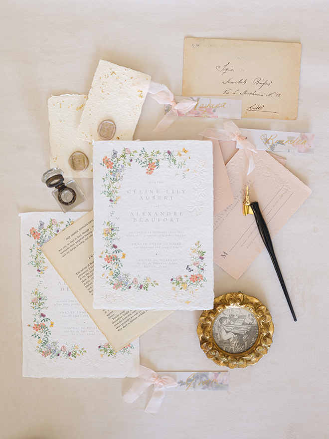 White and pink wedding stationery and invitations. 
