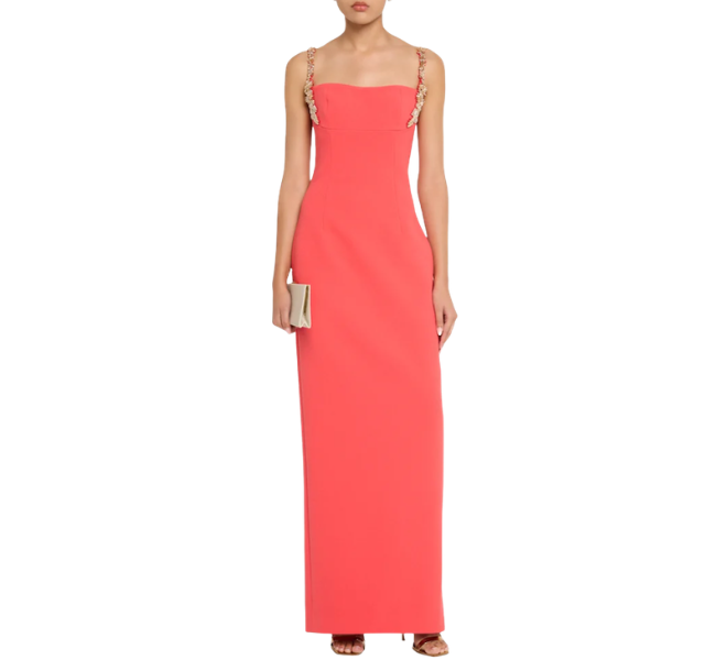 Coral long dress with gold straps.