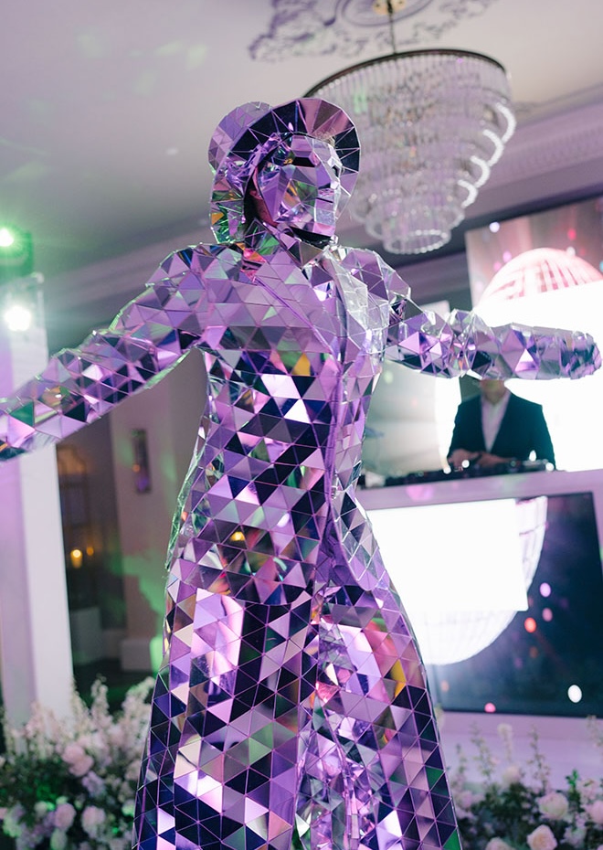 Mirrored dancers perform at the couples Houston wedding reception.