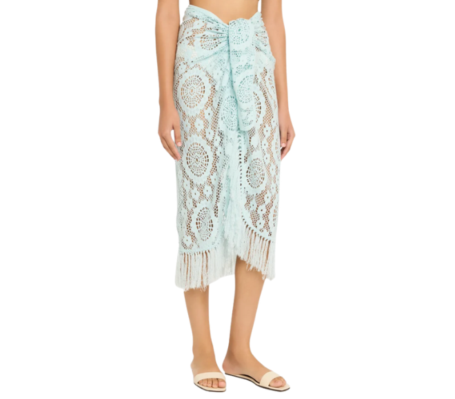 A light blue lace and fringe swim suit cover up. 