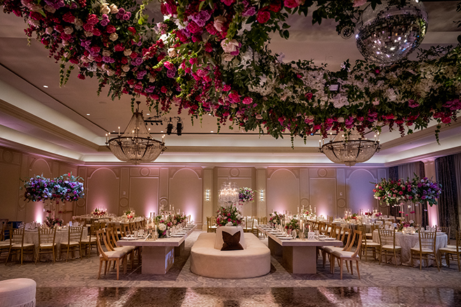 Pink florals and greenery decorate the Grande Ballroom at The Houstonian Hotel, Club and Spa. 