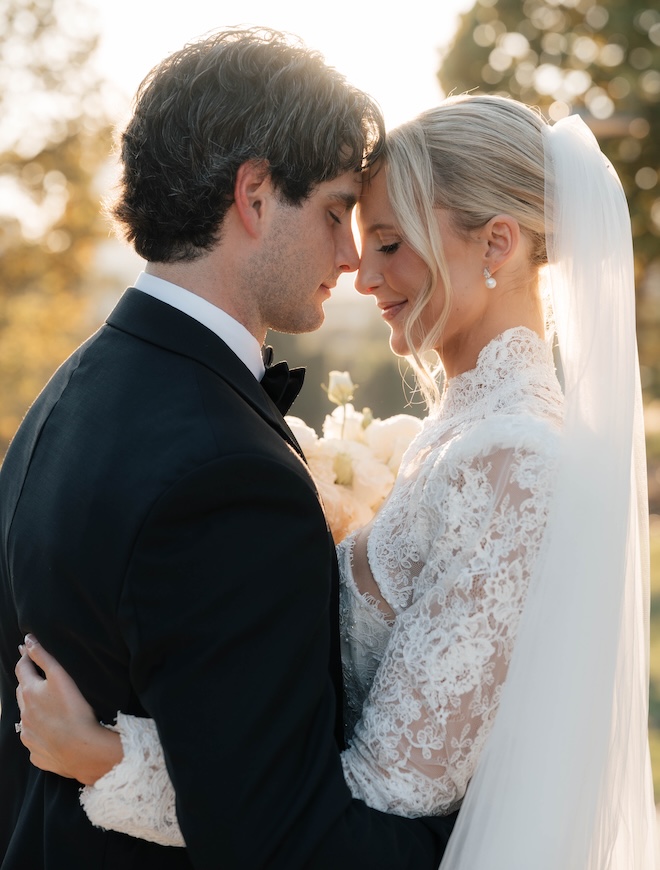 The bride and groom outside their wedding at Le Tesserae. 