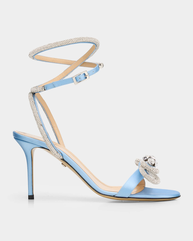 Light blue heels with silver details and strap ups.
