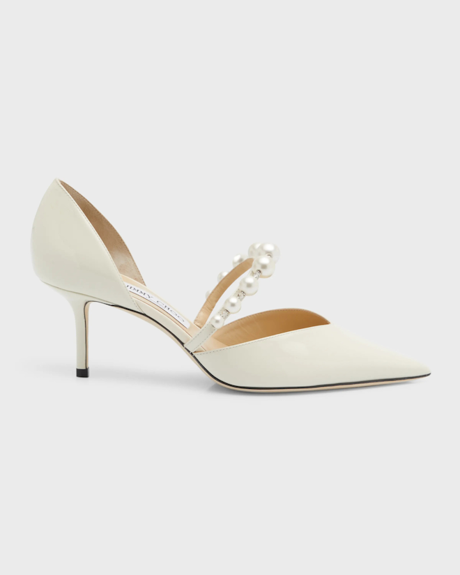 Classic white toe pointed heels with a pearl strap for bridal shoes to wear.