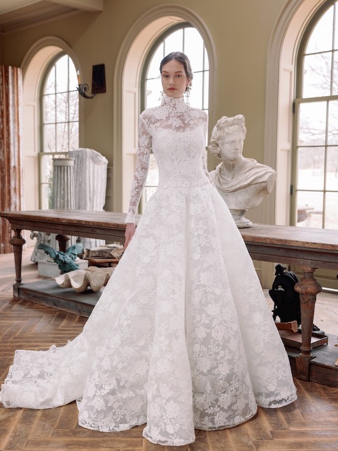 The model wears a lace wedding gown from Sareh Nouri's spring 2026 collection.