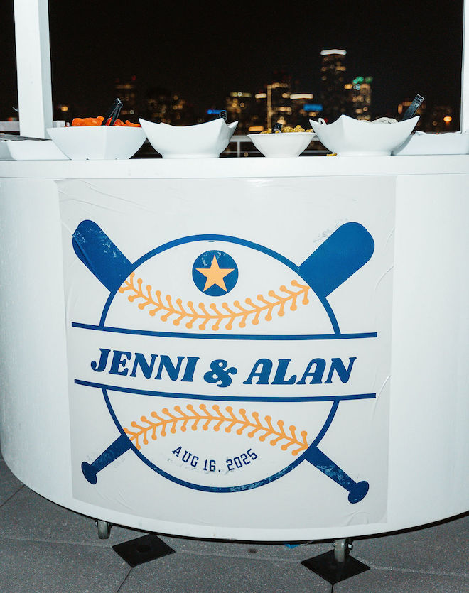 Astors themed burger stand that reads "Jenni & Alan".