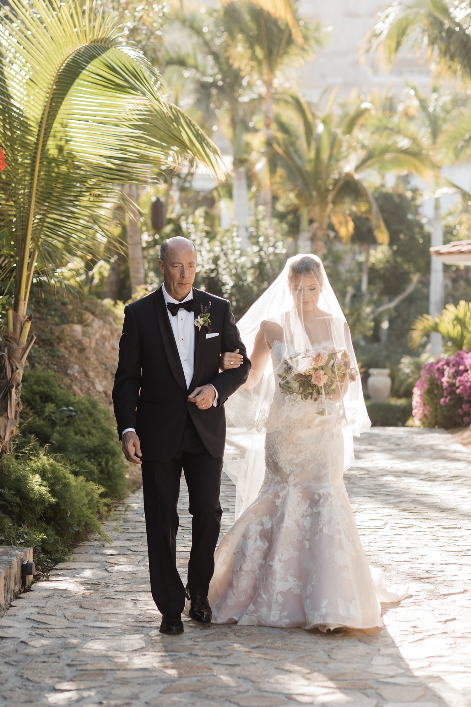 father walking daughter, giving her away