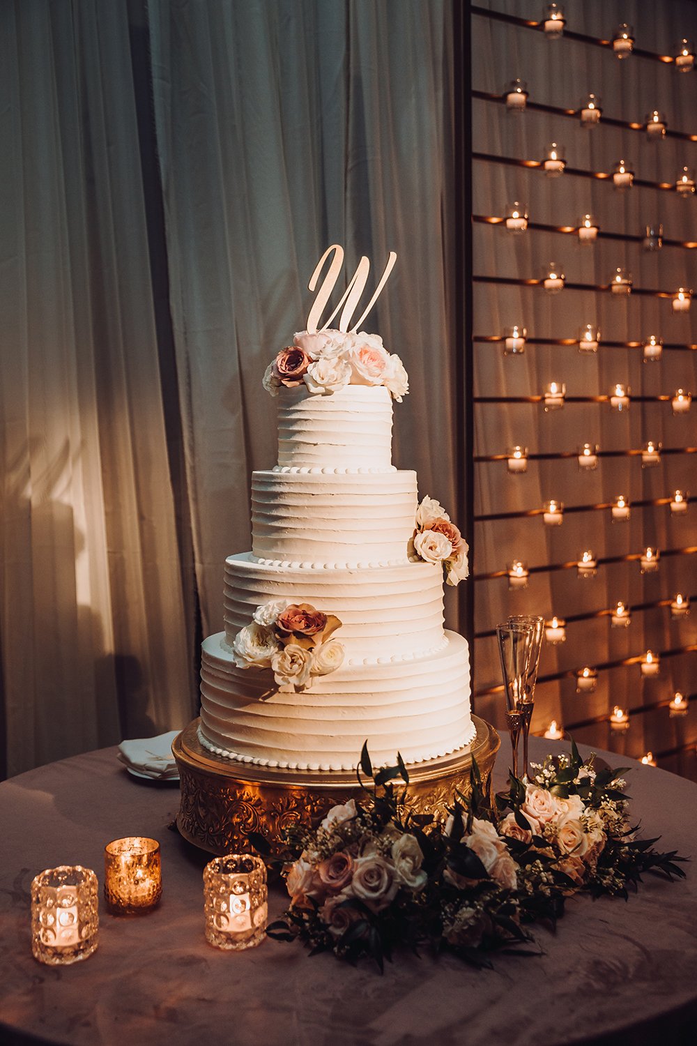 wedding cake design with letter and floral accents by susie's cakes & confections