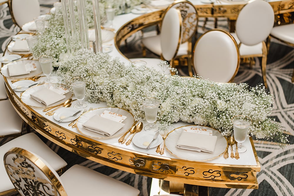wedding reception decor - gold - marble -baby breath flowers 