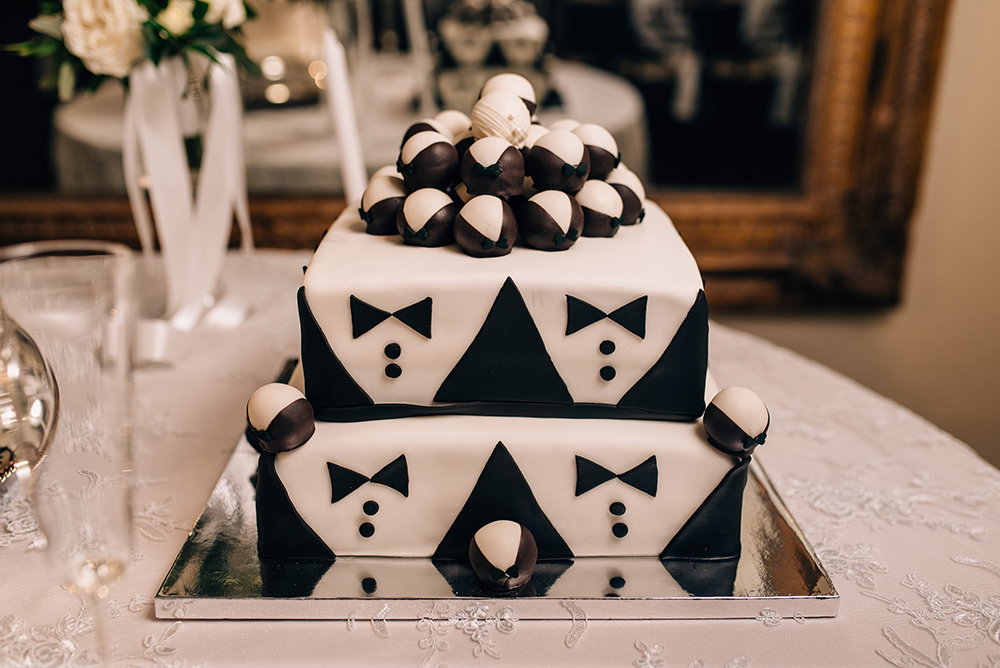 black and white grooms cake, bowties, cake, houston wedding cake, reception decor, cake table