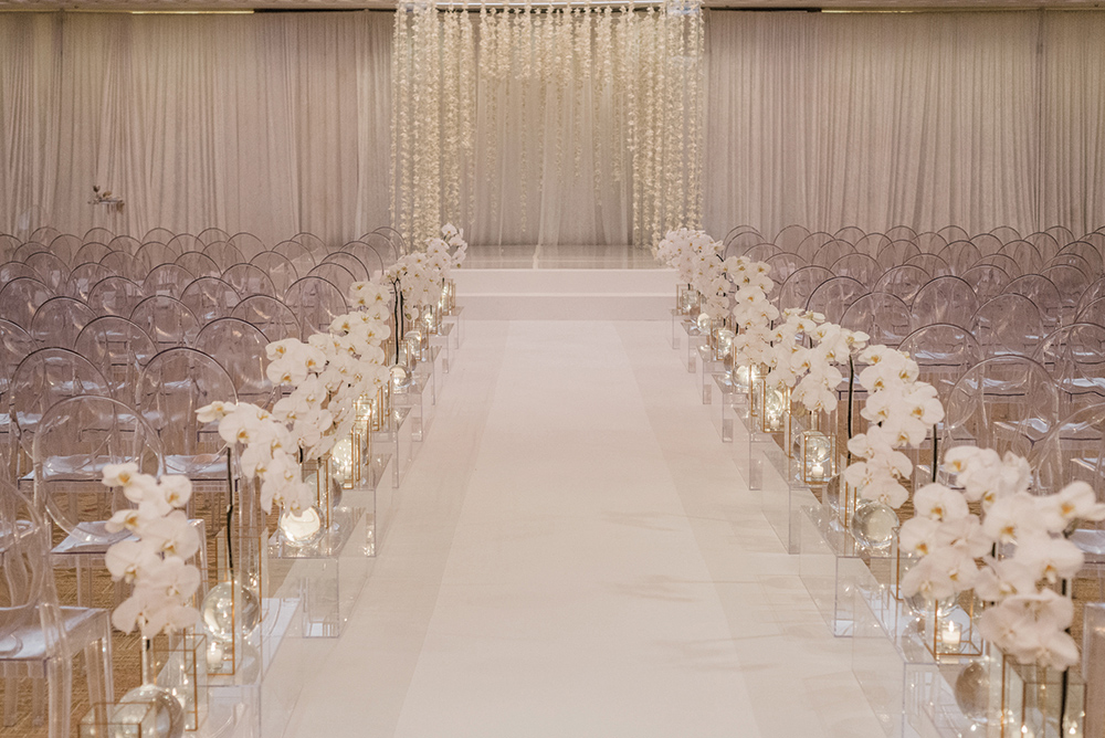 indoor wedding ceremony - hanging floral arrangement ceremony - Plants N' Petals