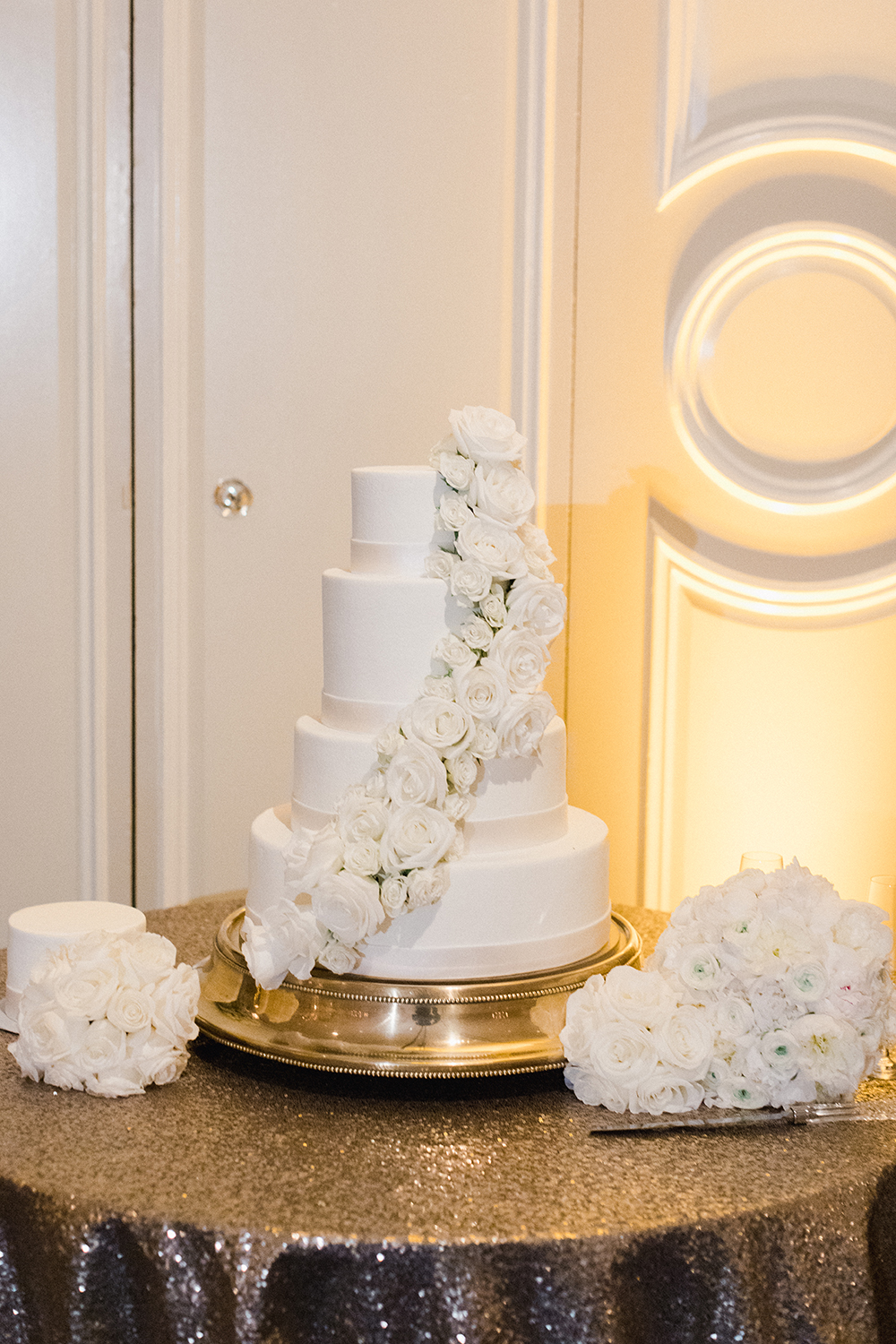 white wedding cake - gold cake stand