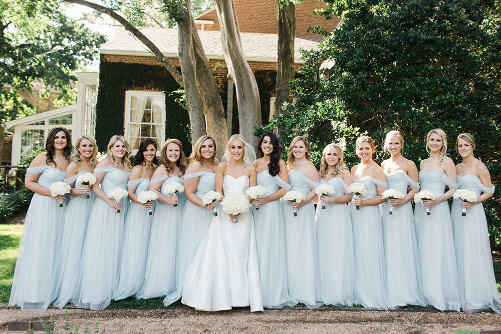 blue bridesmaids dresses - white bouquets - wedding party