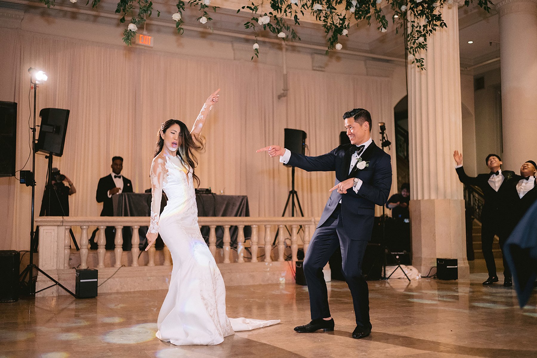 cute dancing photo of newlywed couple