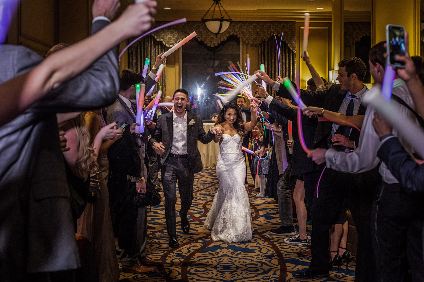 leaving the wedding - sendoff - glow sticks - hotel houston