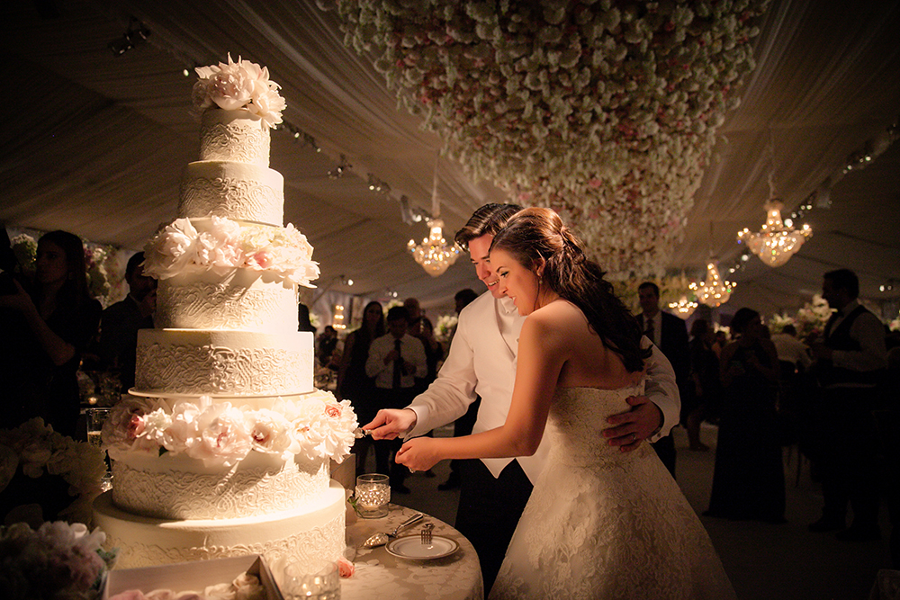 white tower wedding cake cutting