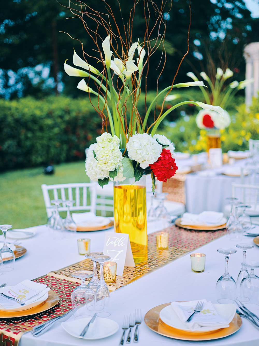 wedding reception decor - outdoors - red - gold - white