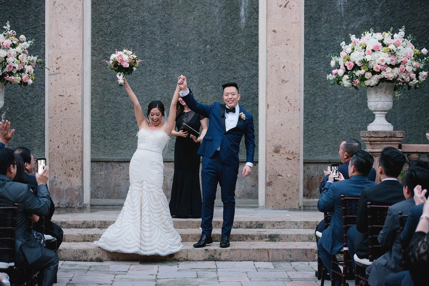 newlyweds - navy tuxedo - wedding flowers